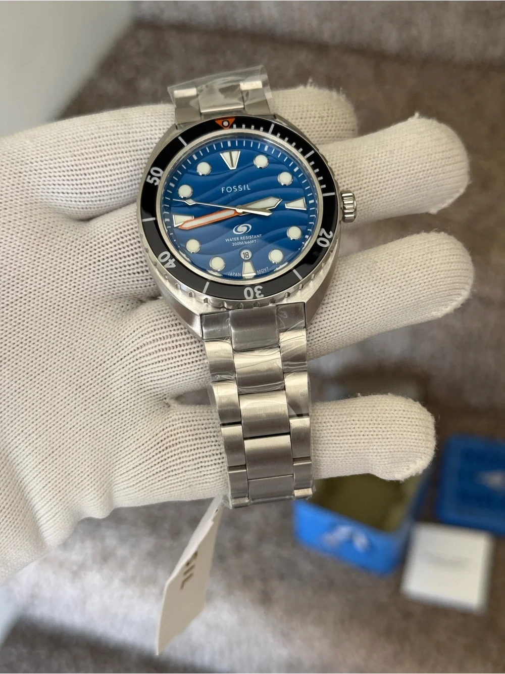 Fossil Men’s Blue Wave Dial Stainless Steel Swim Watch with Black Bezel